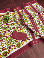 NAYANTHARA PURE MULMUL COTTON IKKAT PRINTD MARRON AND GREEN SAREE