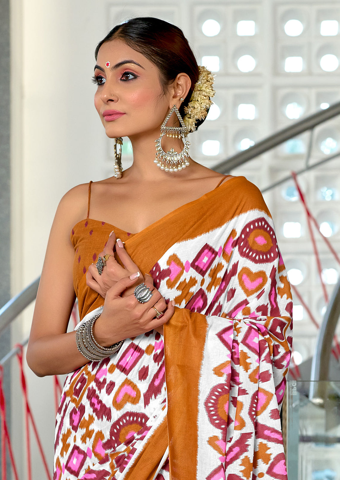 NAYANTHARA PURE MULMUL COTTON IKKAT PRINTD MUSTARD AND PINK SAREE