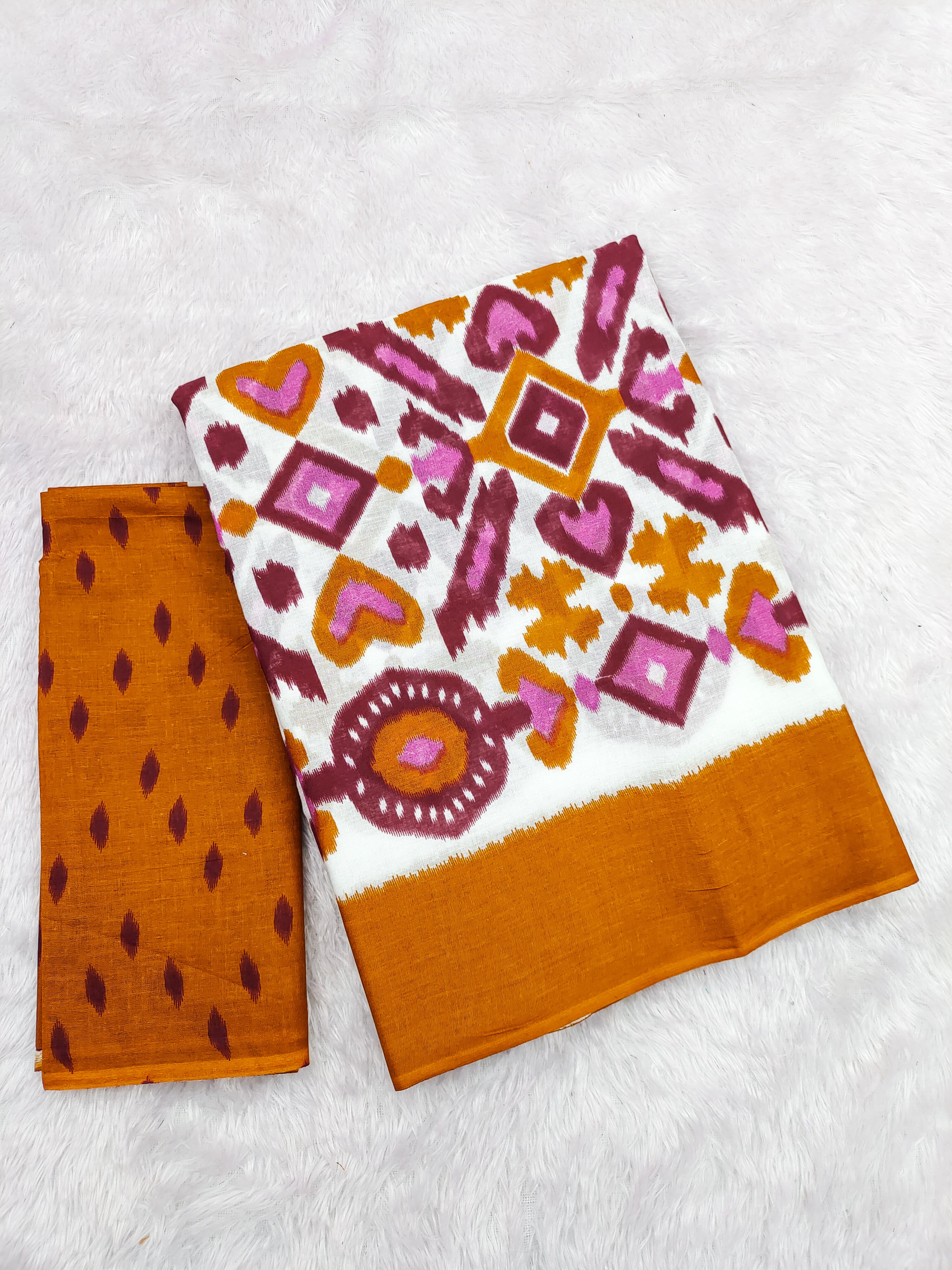 NAYANTHARA PURE MULMUL COTTON IKKAT PRINTD MUSTARD AND PINK SAREE