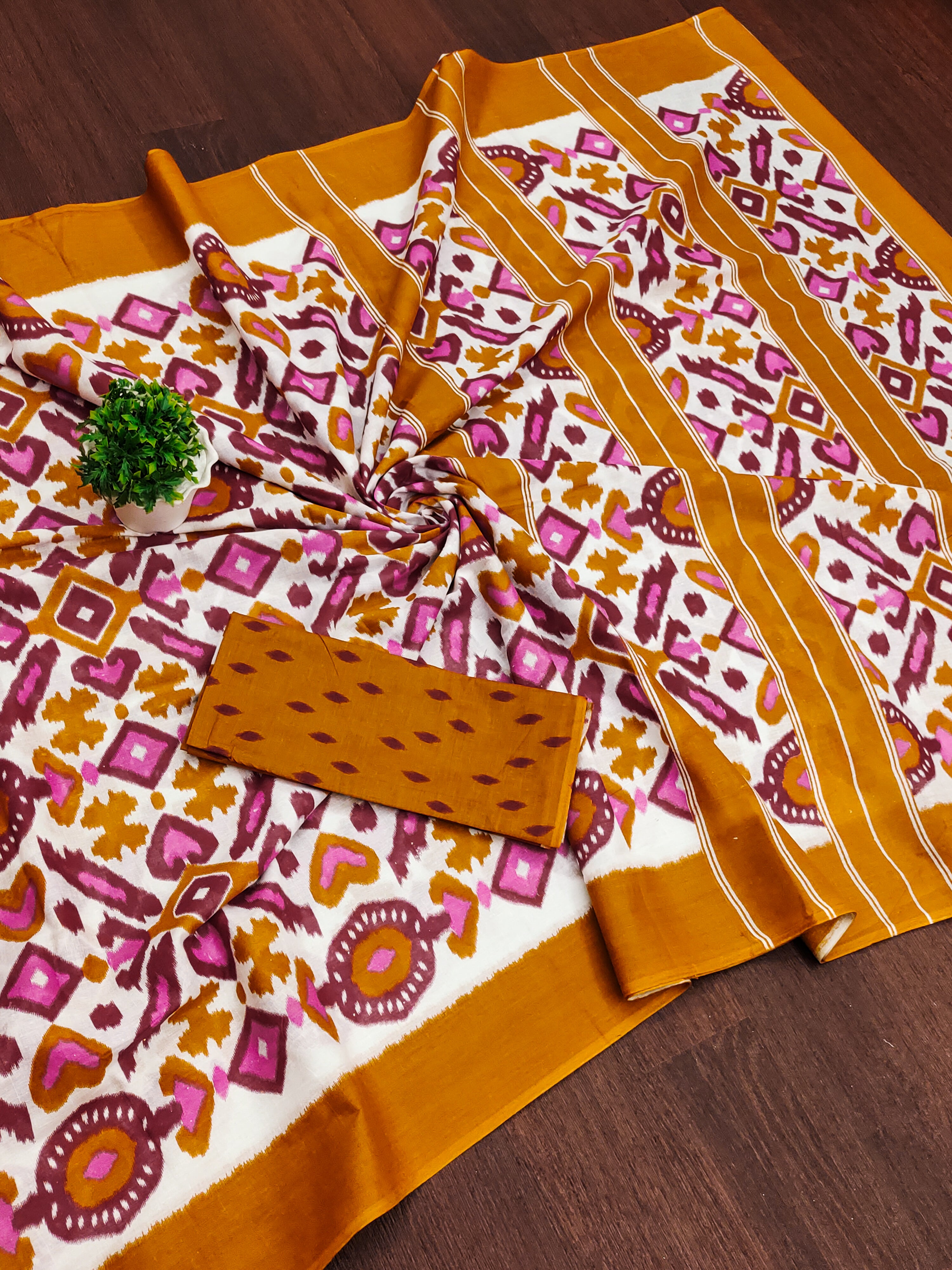 NAYANTHARA PURE MULMUL COTTON IKKAT PRINTD MUSTARD AND PINK SAREE