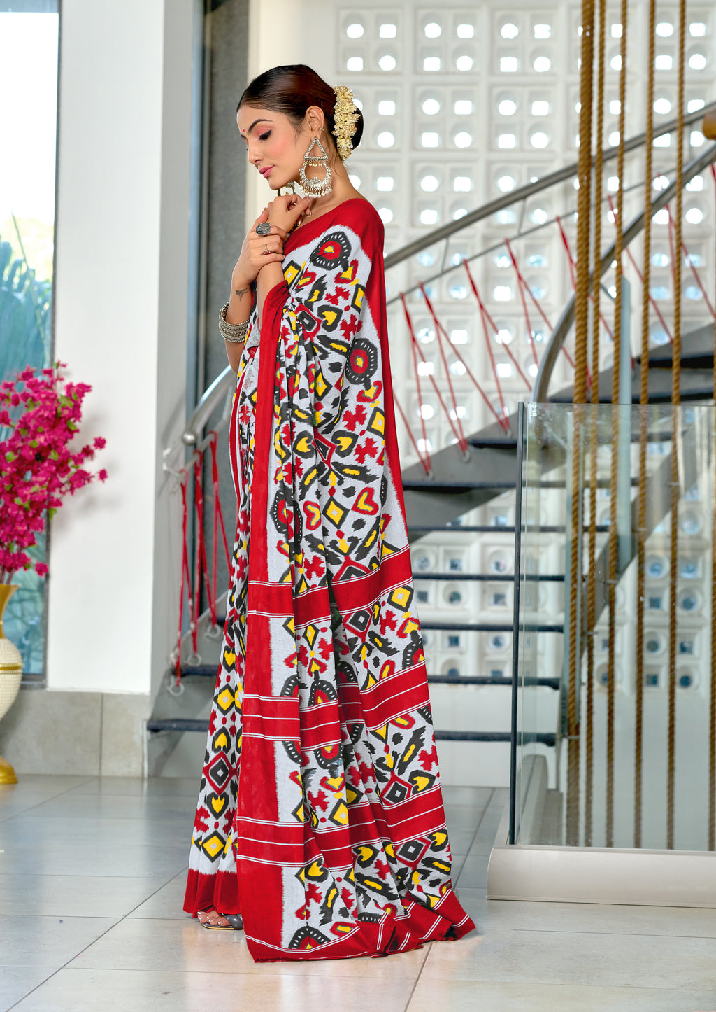 NAYANTHARA PURE MULMUL COTTON IKKAT PRINTD RED AND YELLOW SAREE