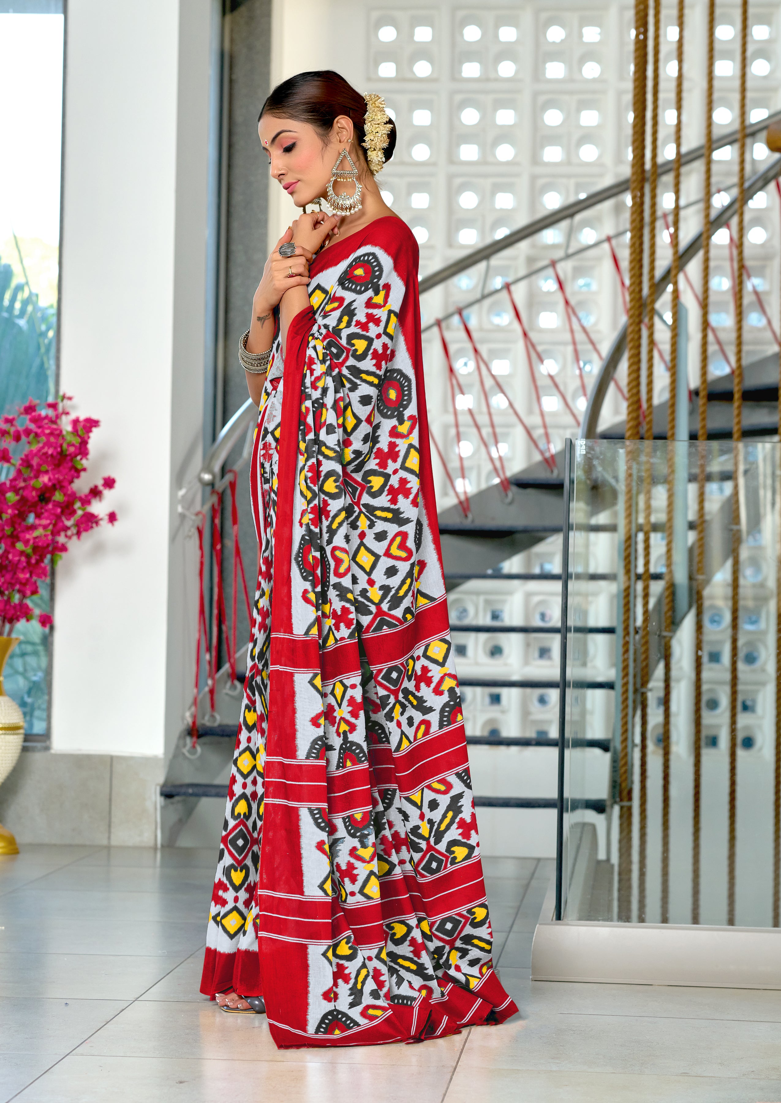 NAYANTHARA PURE MULMUL COTTON IKKAT PRINTD RED AND YELLOW SAREE