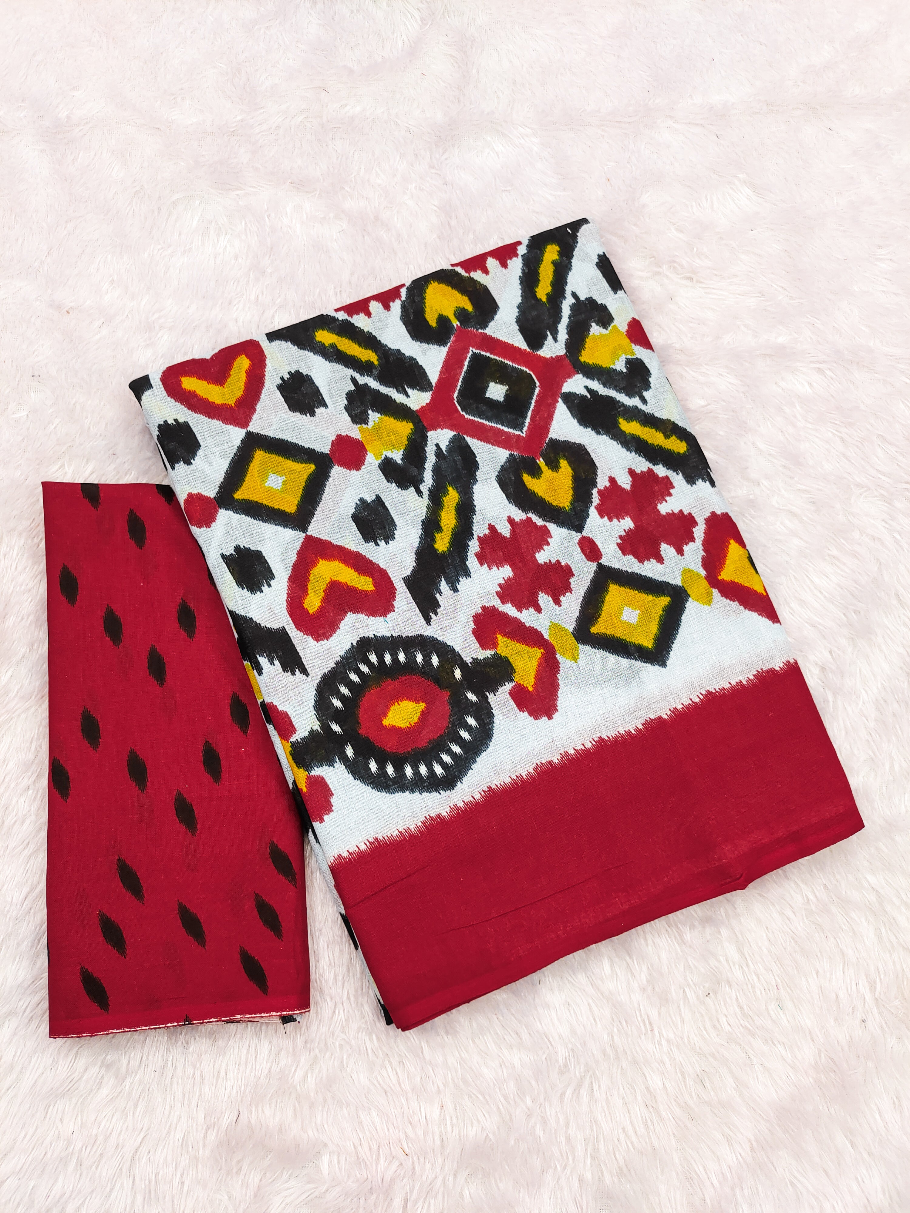 NAYANTHARA PURE MULMUL COTTON IKKAT PRINTD RED AND YELLOW SAREE